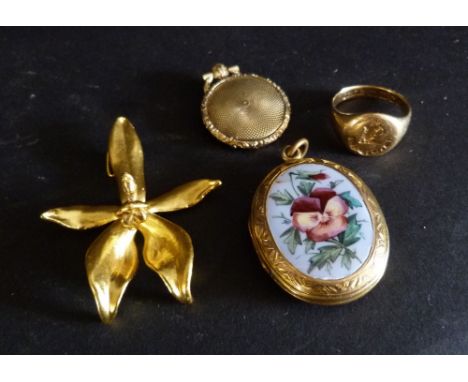 An 18ct. Gold Signet Ring, 7.4 gms, together with a 9ct. gold pendant, 5.1 gms, an enamel decorated locket and another simila