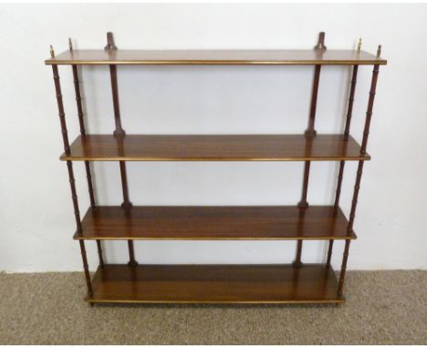 A Mahogany and Brass Inlaid Wall Shelf with turned uprights, 84 cms wide