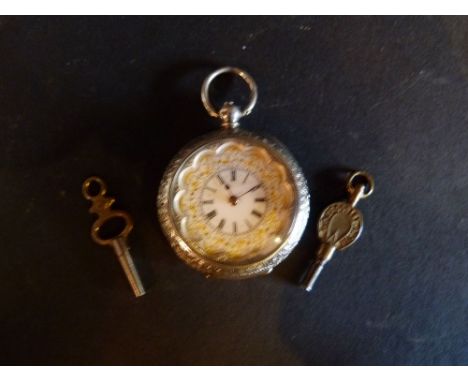 A 19th Century 935 Silver Lady's Pocket Watch, with an engraved case, the enamel gilded dial with Roman Numerals