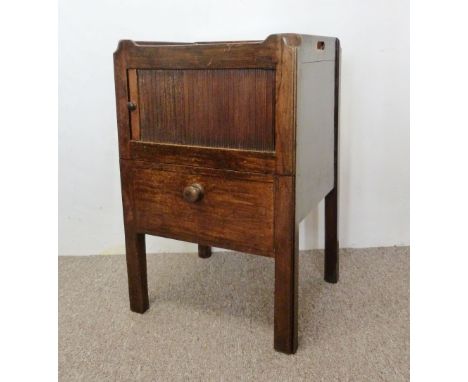 An Early 19th Century Mahogany Washstand, the galleried top above a tambour and pull-out commode with square chamfered legs