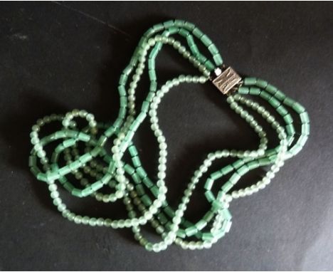 A Chinese Jade Necklace, with silver clasp