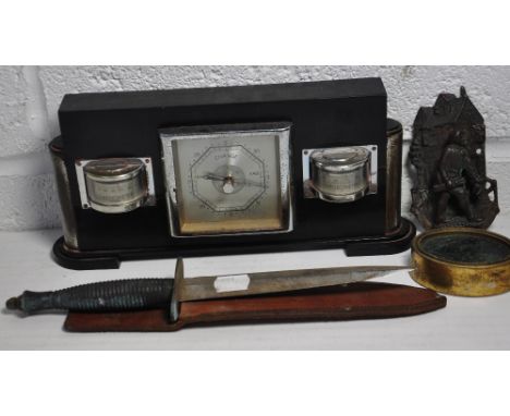 An Art Deco desk weather station combining barometer, thermometer and hygrometer.  Also a military issue WWII dagger with sca