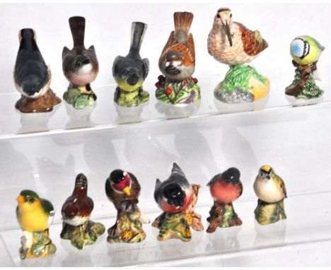 A collection of eleven Beswick birds and a Royal Worcester sparrow 3236 (12).