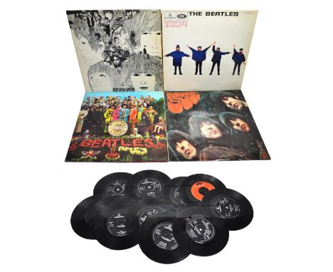 A small quantity of Beatles vinyl albums, EP's and singles to include "A Hard Days Night", "Long Tall Sally", "Ticket to Ride