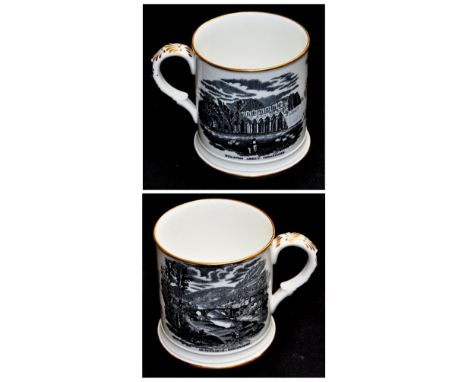 A late 19th century Coalport commemorative mug for Ironbridge, Shropshire, a pair of Shelley candlesticks, a Carlton Ware dre