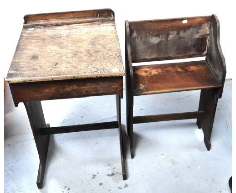 An early 20th century child's school desk and accompanying bench (2).