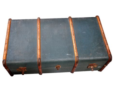 An early/mid 20th century green travelling trunk.