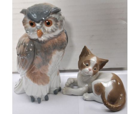 A Nao owl and a Lladro cat.