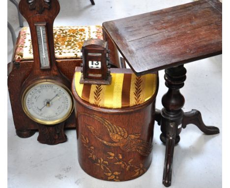 A occasional table on tripod legs, two oak storage units with upholstered seats and an oak barometer and a small early 20th c