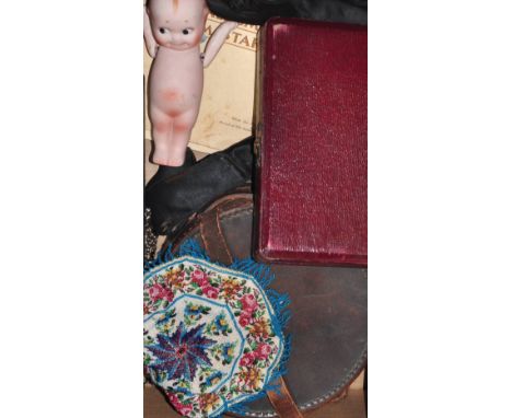 A collectors lot comprising a pair of early to mid Victorian black silk and satin French child's shoes with bead decorated bo