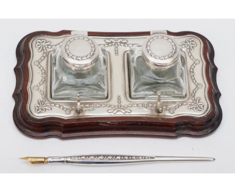 A cased silver mounted pen stand and twin inkwell, by Carr's of Sheffield Ltd, Sheffield 1994, with swag and bow embossed dec