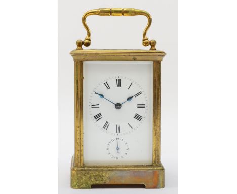 A 20th century brass corniche cased hourly striking alarm carriage clock, the white dial with black Roman numerals and subsid