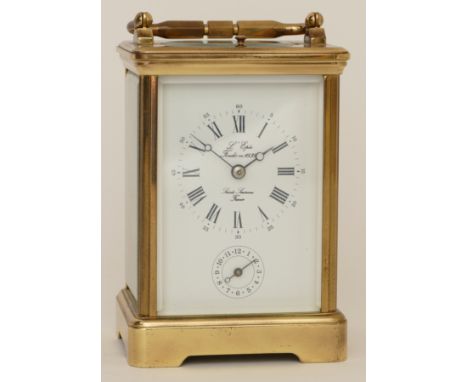 L'Epee, a 20th century French brass corniche cased half hourly striking repeating carriage clock, the white dial with black R