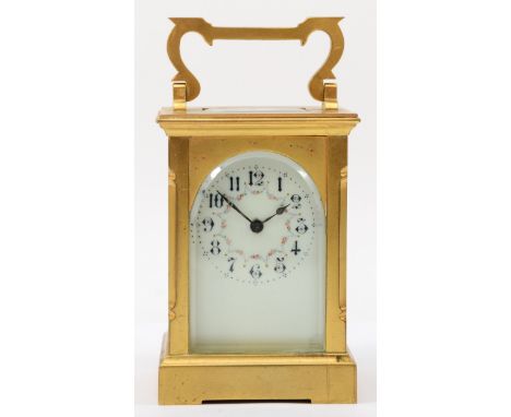 A 20th century French brass corniche cased carriage clock, with hourly striking movement, the white dial with black Arabic nu