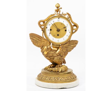 A 19th century gilt brass striking and calendar mantle clock, the white enamel chapter ring with black Arabic numerals and da