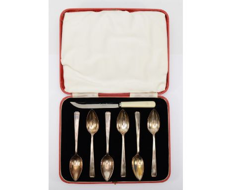 A cased set of six George VI silver grape fruit spoons, by Cooper Brothers &amp; Sons Ltd, Sheffield 1938, 154gms, with a fau