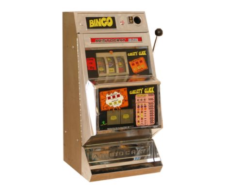 Aristocrat Elite Bingo one arm bandit electromechanical three reel slot machine, serial number HT 409, 10p play, together wit