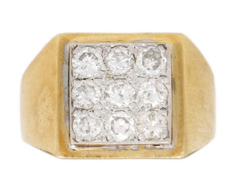 An 18ct hallmarked gold diamond set gentleman's ring. Pave set with nine round brilliant cut diamonds, each of 0.07ct estimat