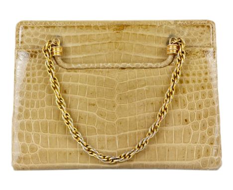 A Gucci crocodile handbag with chain handles. Gold tone hardware, stamped 'Made in Italy by Gucci' to the interior, with a Gu