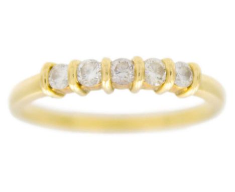 An 18ct diamond set five-stone hoop ring. The round brilliant cut diamonds each of 0.04ct estimated weight, stamped 750, size