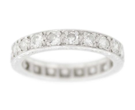 An early 20th-century platinum diamond set full eternity ring. The round cut diamonds of 1.00ct total weight approximately, t