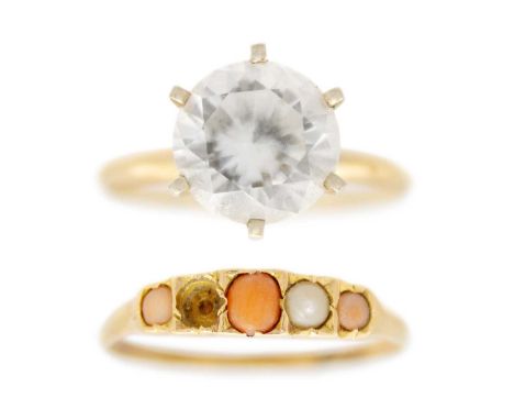 An antique 15ct coral and pearl set five stone ring and a 14ct cz set cocktail ring. The coral and pearl ring with worn hallm