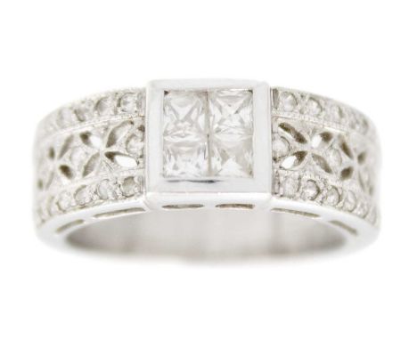 A modern 18ct white hallmarked gold stone set band ring. Set with white stones, import hallmark and stamped 750, size N, 7.3g
