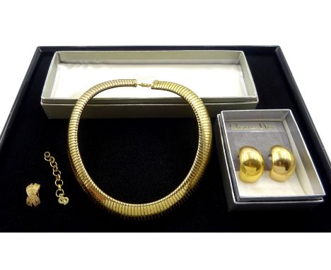 Christian Dior jewellery including expanding snake link collar necklace, pair of curved clip on earrings and a single clip on