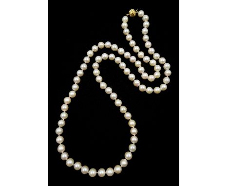 Single strand pearl necklace, eighty-three pink/peach cultured pearls, with 9ct gold ball clasp, maker's mark SP, Birmingham 