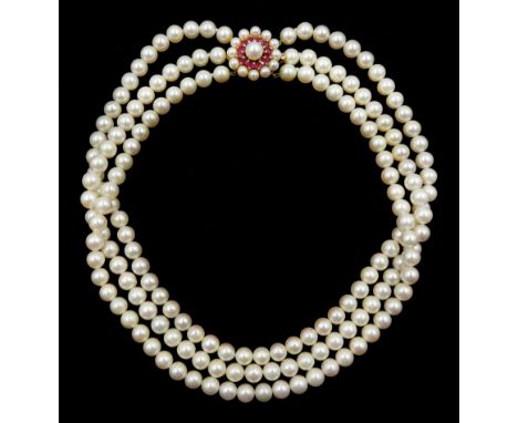 Three row cultured pearl choker necklace, with 9ct gold pearl and ruby clasp, London 1985Condition Report:Length approx 36cm,