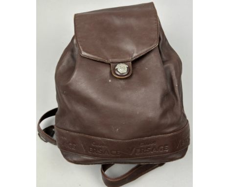 A VINTAGE GIANNI VERSACE BROWN LEATHER BACKPACK RUCKSACK, 32cm x 30cm Overall good condition. Some damage to one strap (see p