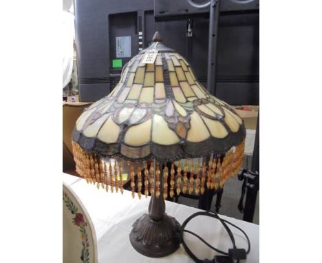 A good quality table lamp with Tiffany style beaded shade.