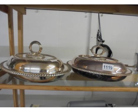 Two silver plate vegetable tureens.