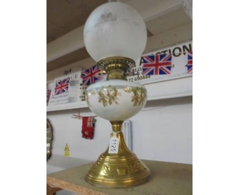 A Victorian brass oil lamp with hand painted font., COLLECT ONLY.