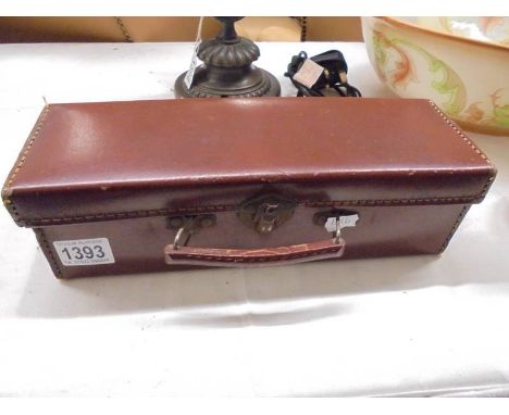 A small rectangular vintage glove case.