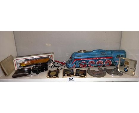 A box of miscellaneous including The friction train, Bachmann train, Morris Minor badge &amp; other car items etc.