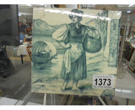 A Minton vintage ceramic tile painted by William Wise depicting a barefoot lady with a basket by the sea or a lake.