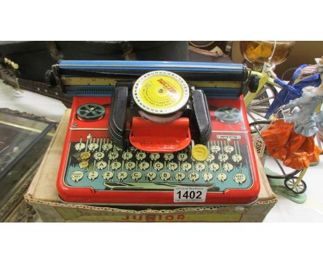 A boxed circa 1970's Mettype Junior Typewriter.