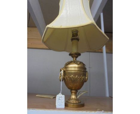 A good quality Adam style brass table lamp with shade.