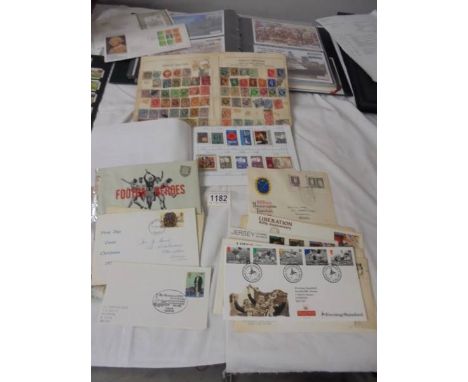 An album of first day covers, stamp album etc.,