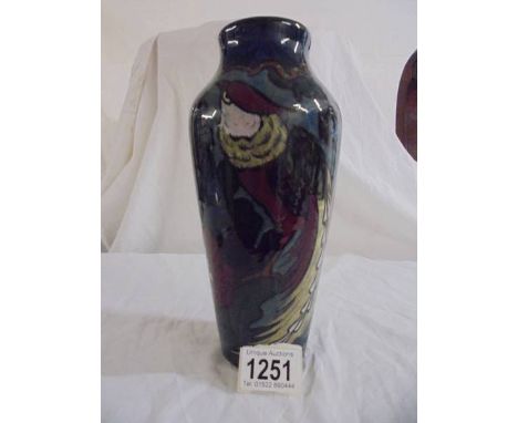 DECORO, made in England regd. No. 429479.&nbsp; A vintage 9.5" high vase in deep colours depicting a bird with a long tail am