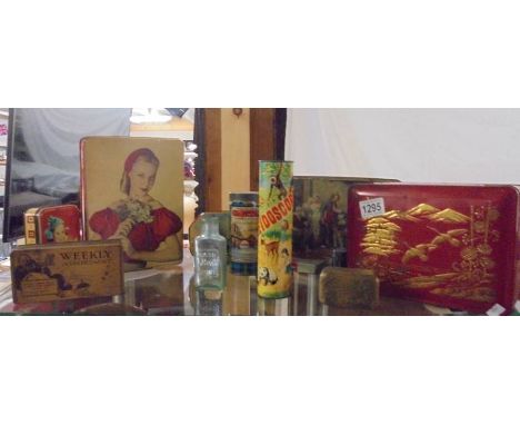 A mixed lot of vintage tins etc.,