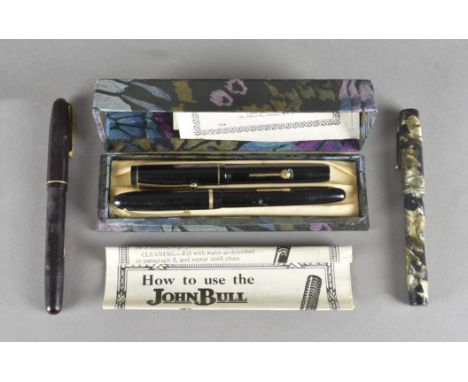 Three Watermans fountain pens, all with gold nibs, one marbled, together with a John Bull fountain penNo obvious cracks or sp