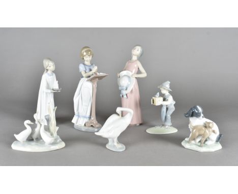 Four Lladro porcelain figures, three of children, one of a swan, together with three other porcelain figure groups 