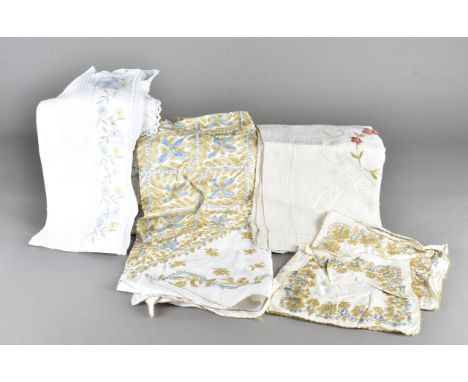 A large collection of British and continental table textiles, including cloths, napkins, embroidered etc 