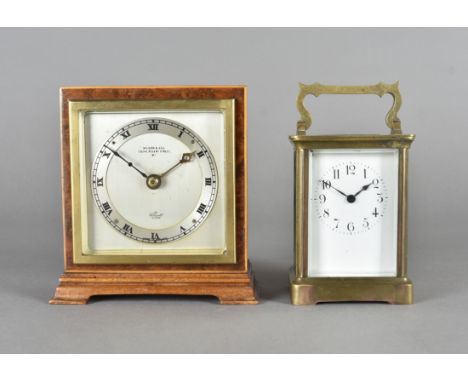 A brass carriage time piece,   an art deco burr walnut time piece mantle clock on bracket feet 14cm high, 