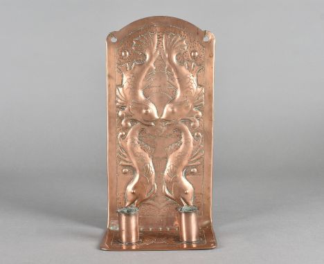 An art nouveau copper wall sconce, with hammer beaten decoration of fish, 28 cm x 14 cmNo obvious restoration. A few light sc