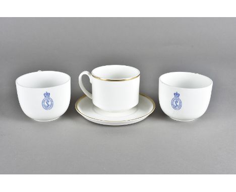 A Royal Navy Sutherland china part coffee set, having blue Naval crest on white ground, marked with broad arrow and dated 196