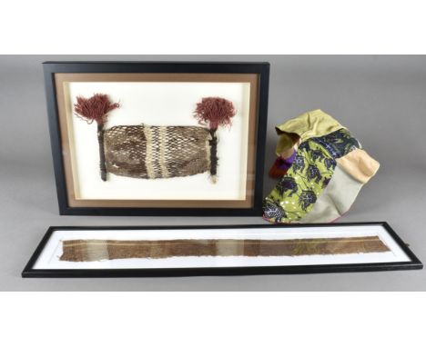 Two antique framed textiles, one a rectangular example of a part of a woven design to edge of a plain weave of cotton with an