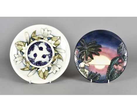 Two Moorcroft pottery commemorative year plates, tube-lined design, Birth of Light, 23 cm together with another June berry pa